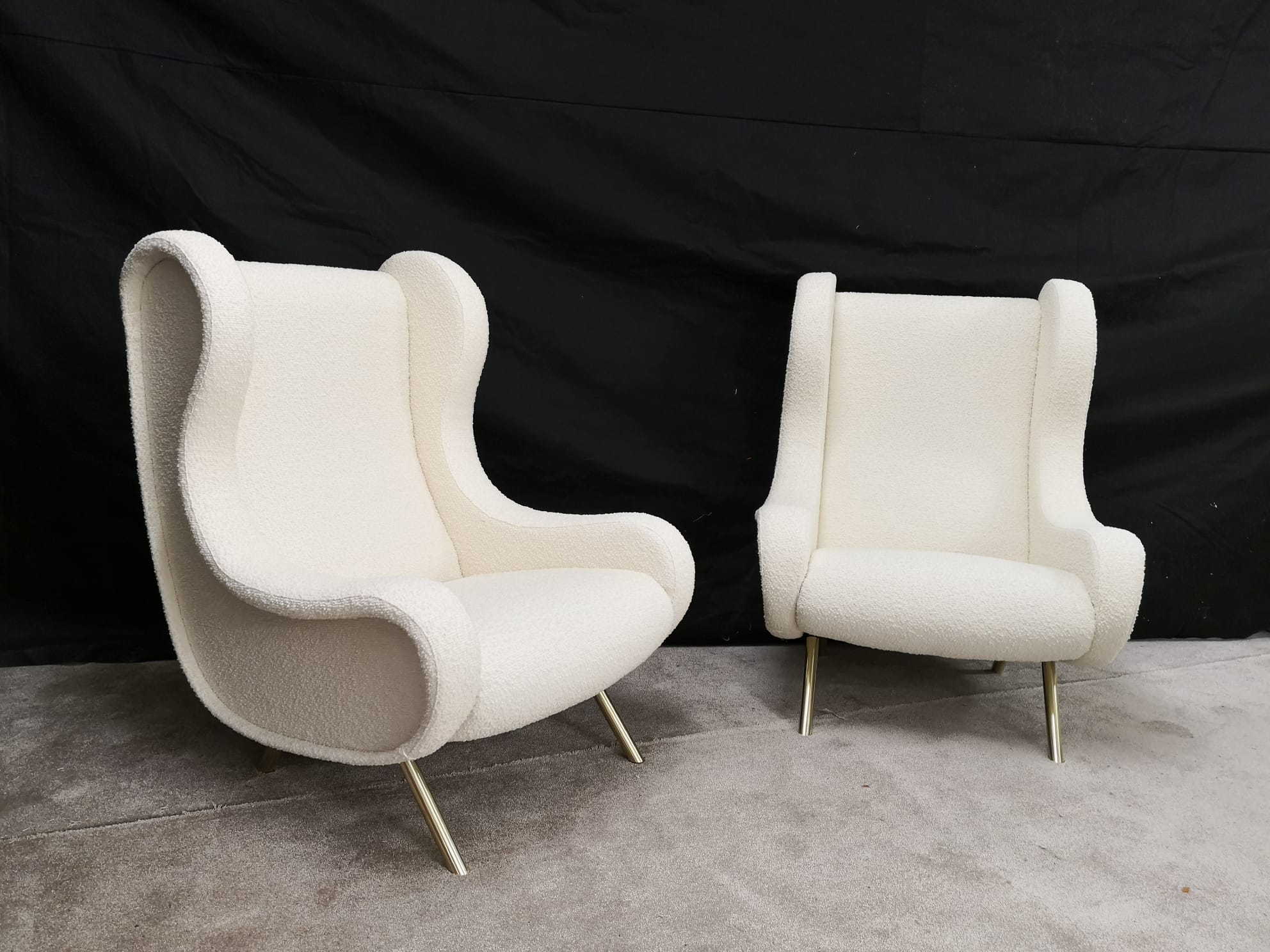 Pair of white buckle chairs