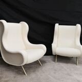 Paire de fauteuils bouclette blancs