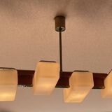 Scandinavian chandelier, brass, precious wood, 4 lights, shuttle 102 x 35 x 9 cm