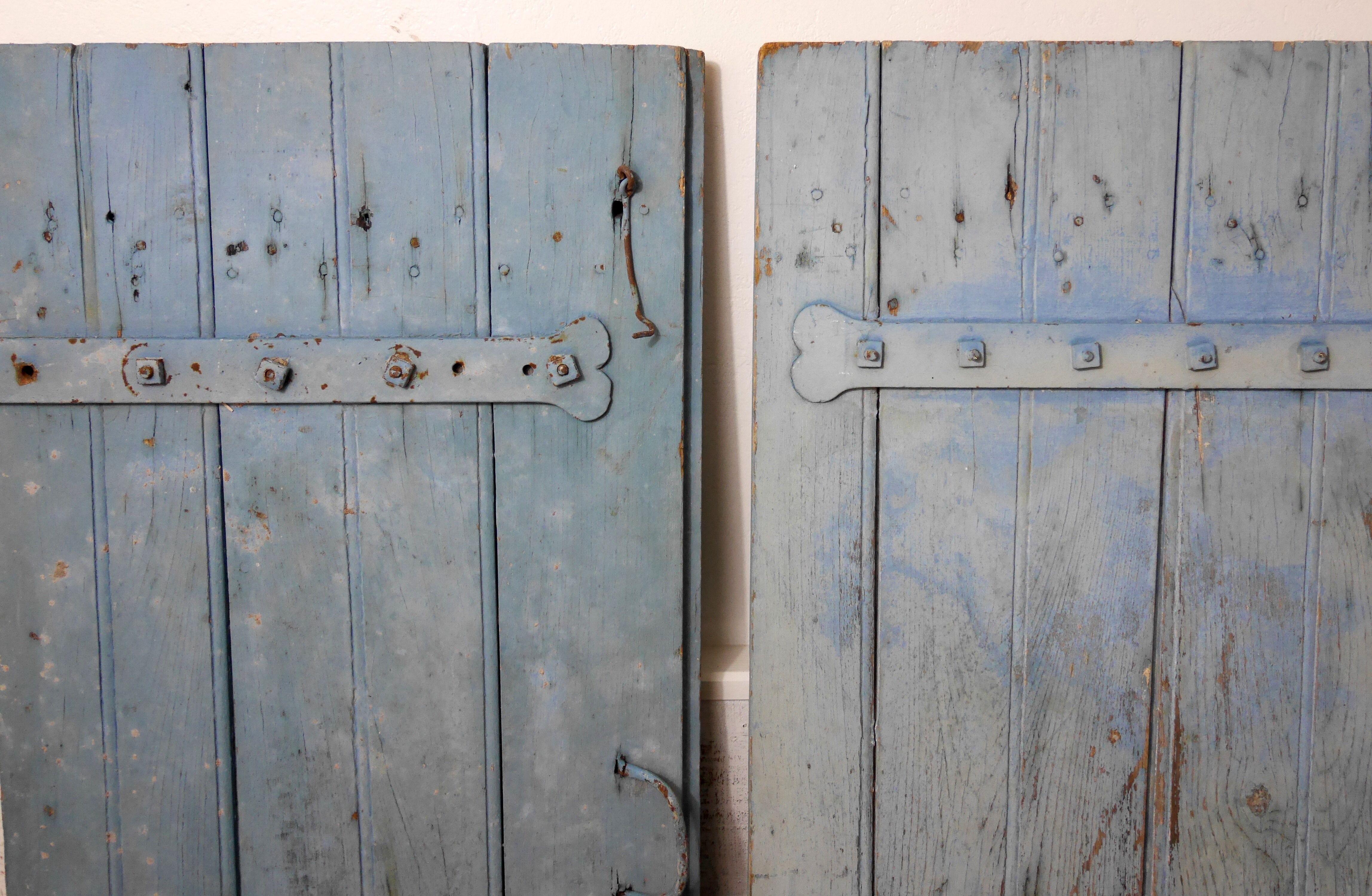 Pair of old blue shutters