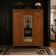 Art deco wardrobe in raw oak with bevelled mirror.
