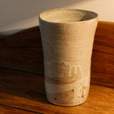 Sandstone vase by Puisaye, signed Pierre Lion