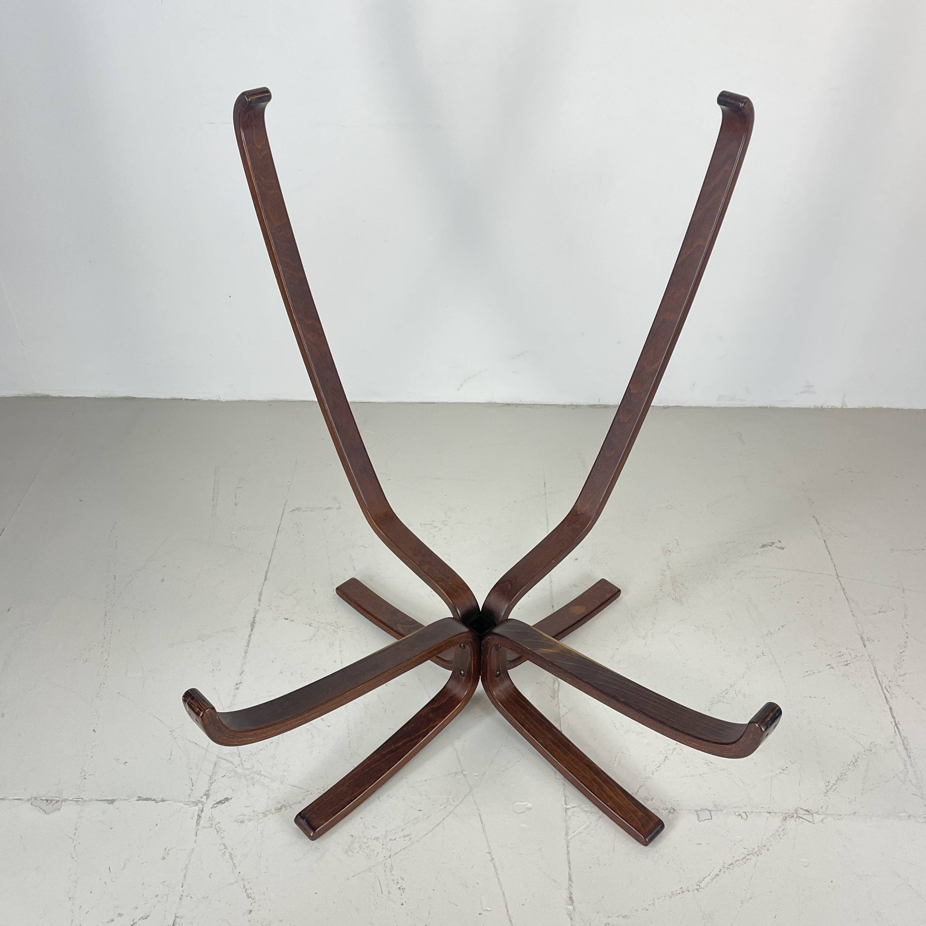 Vintage winged leather high backed Falcon chair designed by Sigurd Resell