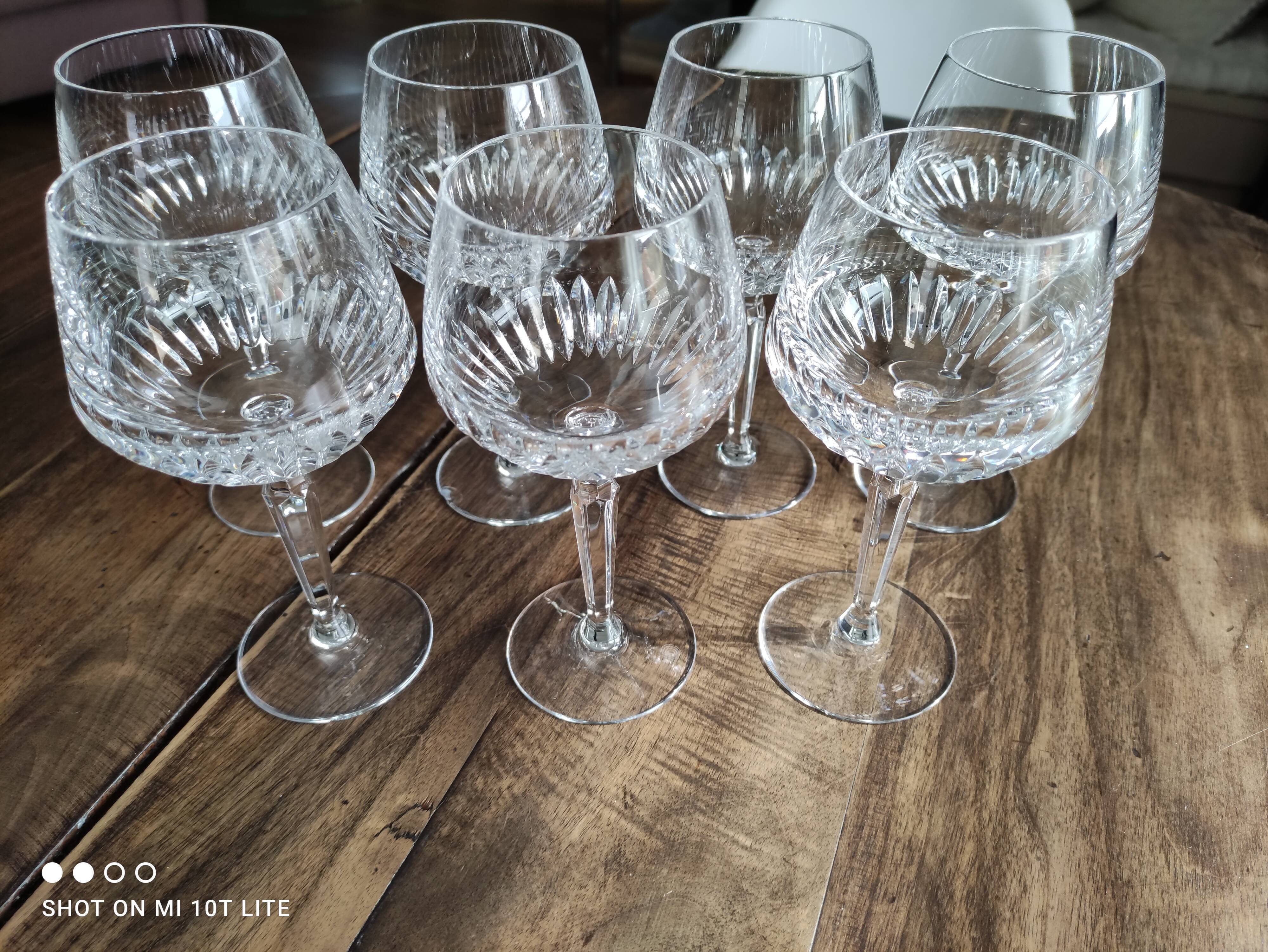 Set of 7 cut crystal wine glasses