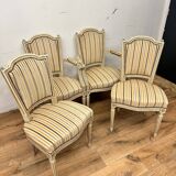 2 convertible armchairs and 2 Louis XVI style chairs
