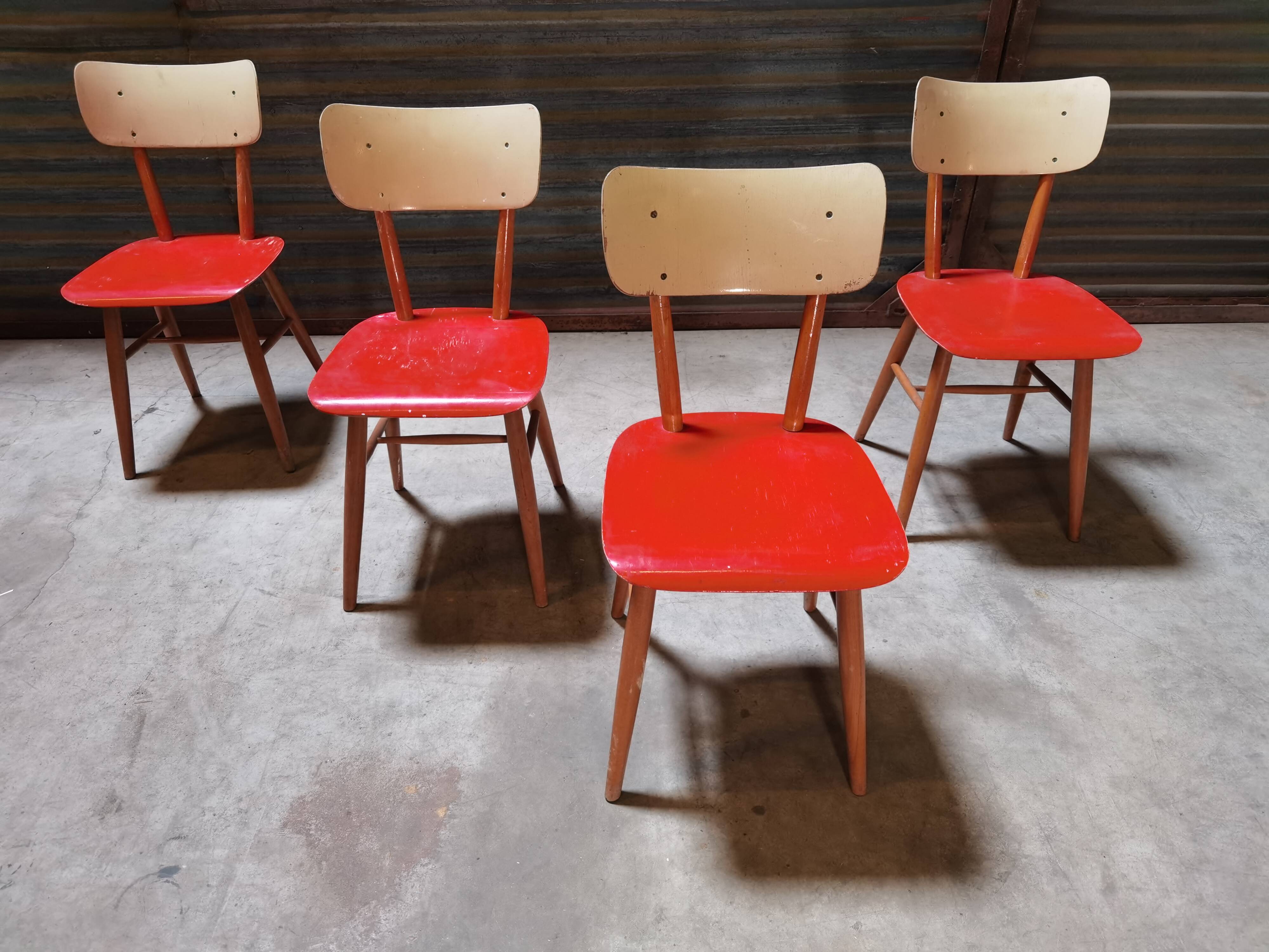 Set of 4 red wooden chairs published by Ton, 60s