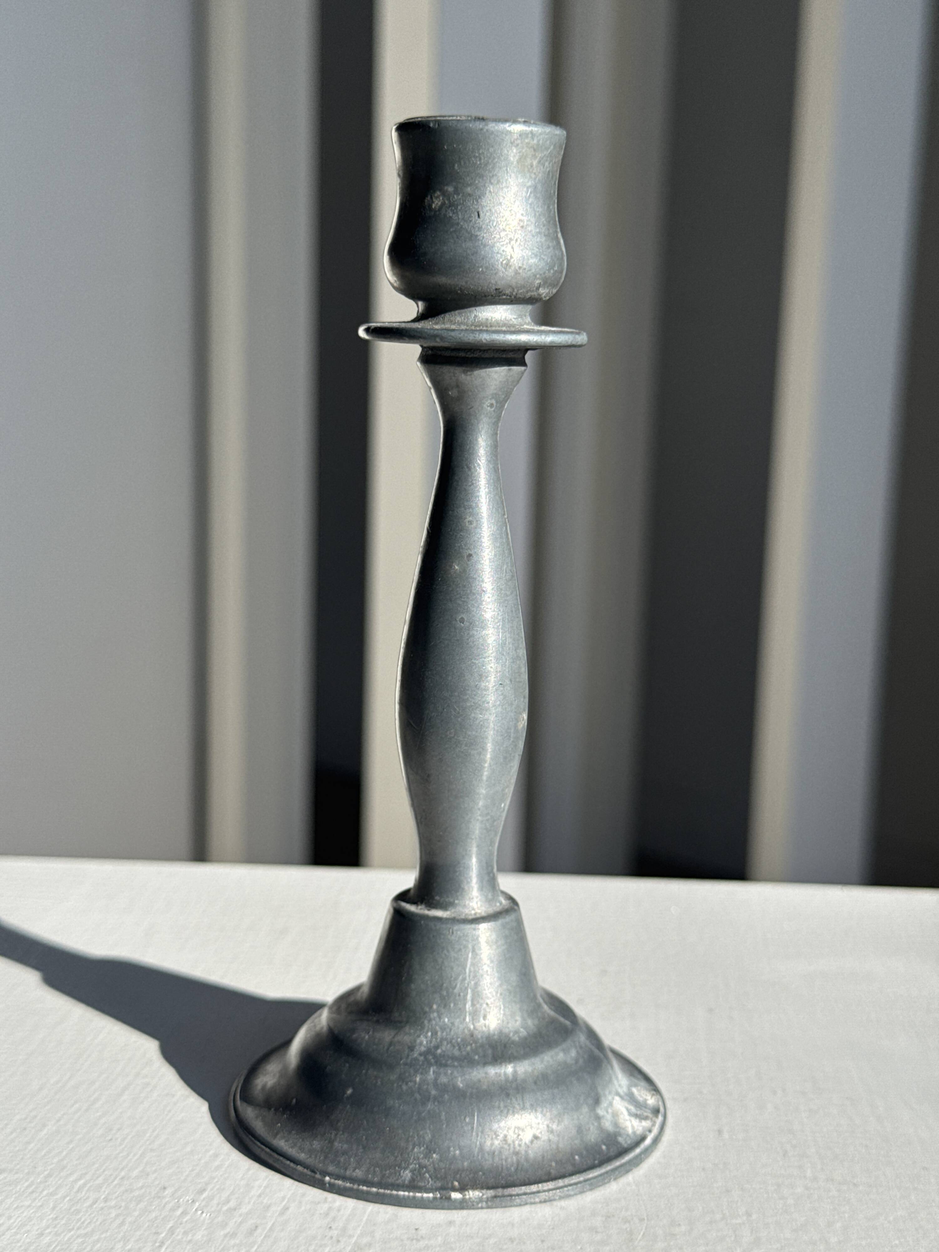 Pair of small fine candlesticks in tin H15.5
