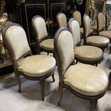 Suite of 12 Louis XVI style chairs model of Georges Jacob with Console Late nineteenth