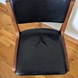 Vintage leather and wood chair pair
