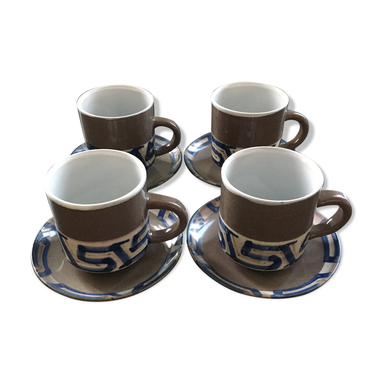 Set of 4 brown stoneware mugs and saucers with blue decor