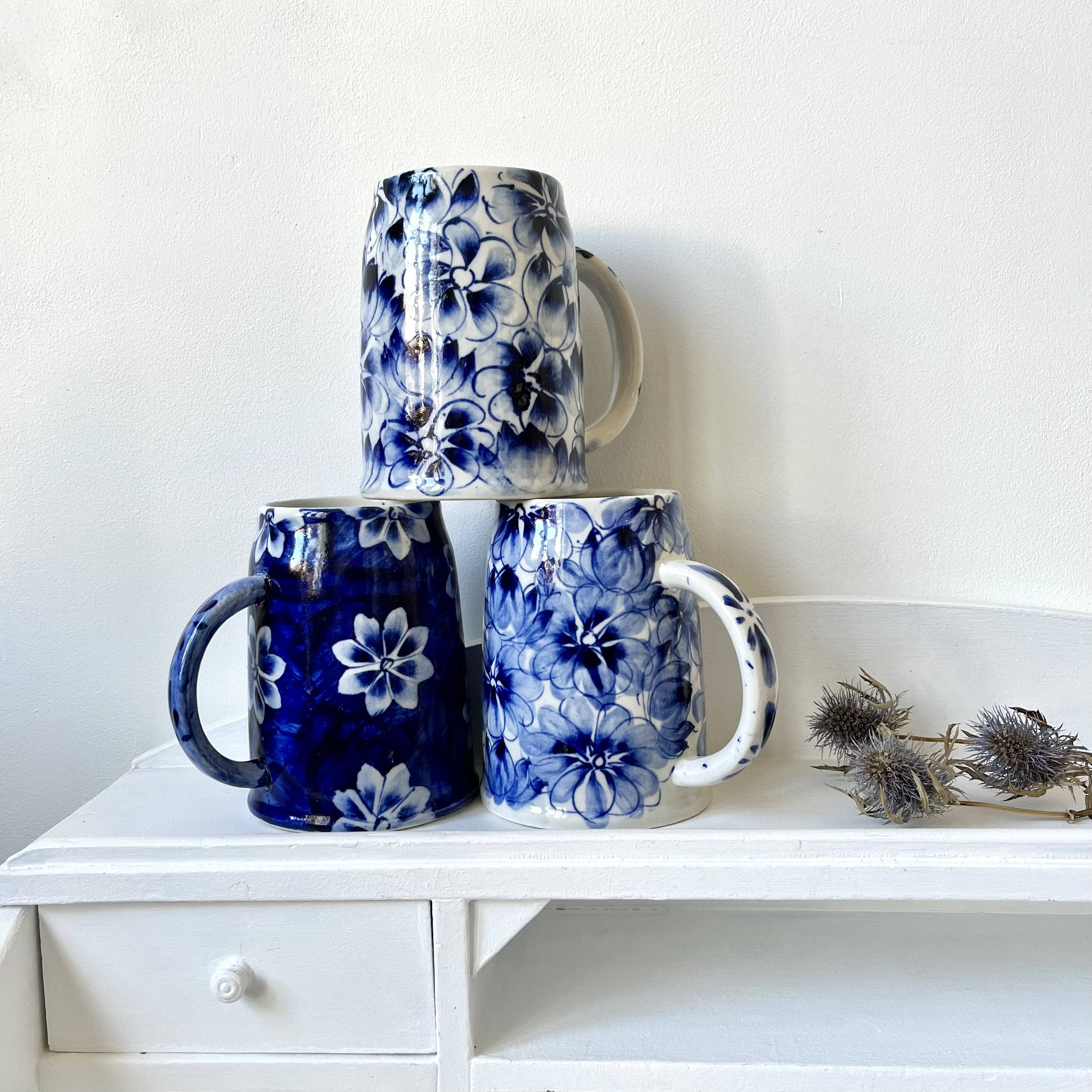 Blue flowered mugs or large tankards