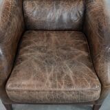Very comfortable vintage cow leather armchair with character