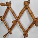 Portemanteau mural extensible en bois imitant le bambou, sept patères