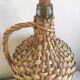 Demijohn old dress in vintage rattan