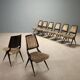 Lot de huit chaises vintage avec embouts en laiton