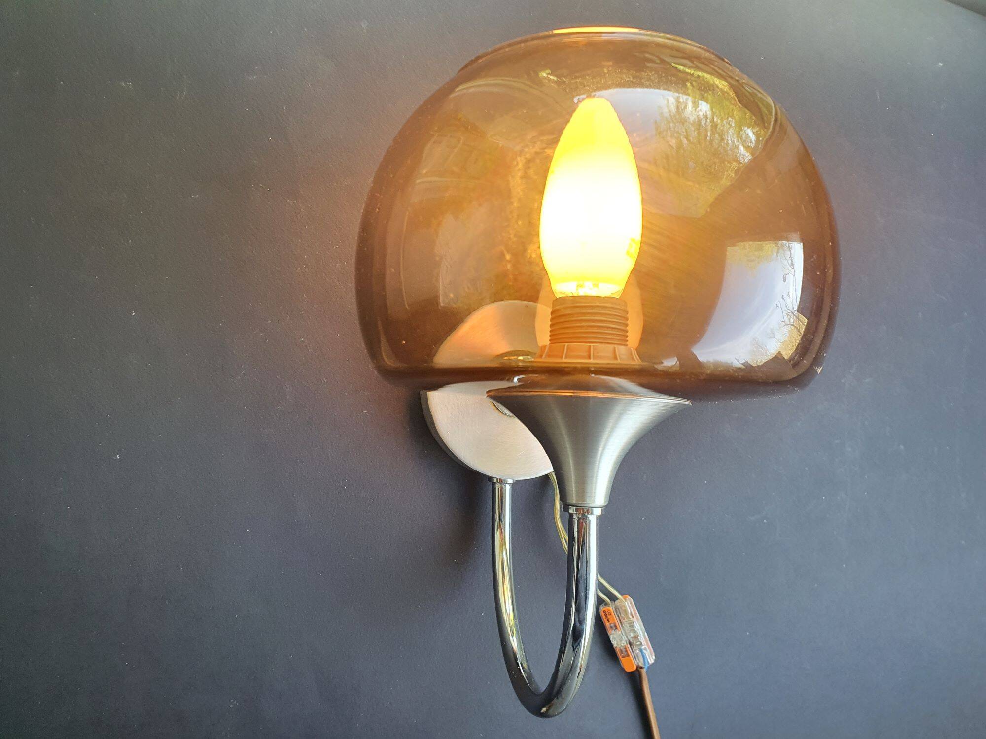 Chrome metal wall light with smoked glass from the 1980s.
