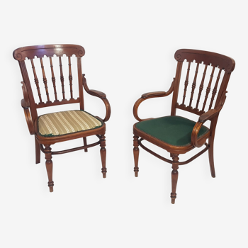 Pair of curved wooden armchairs 1900