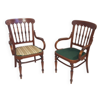 Pair of curved wooden armchairs 1900