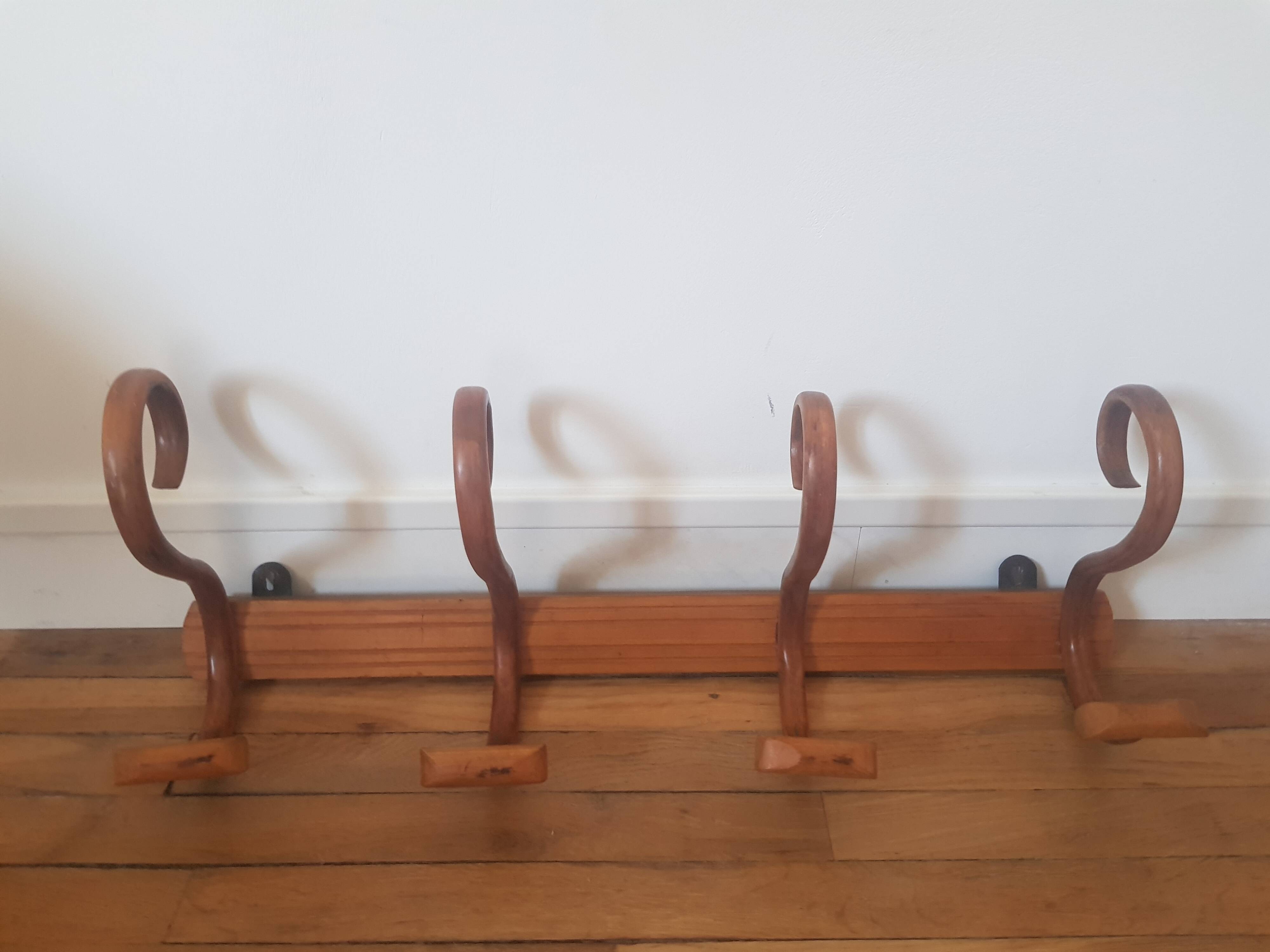 Wooden wall coat rack
