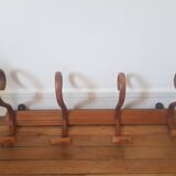 Wooden wall coat rack