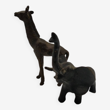 Elephant and giraffe in bronze patinated brass.