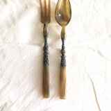 Old corn and silver salad cutlery