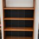 Modernist showcase library with sliding glass doors