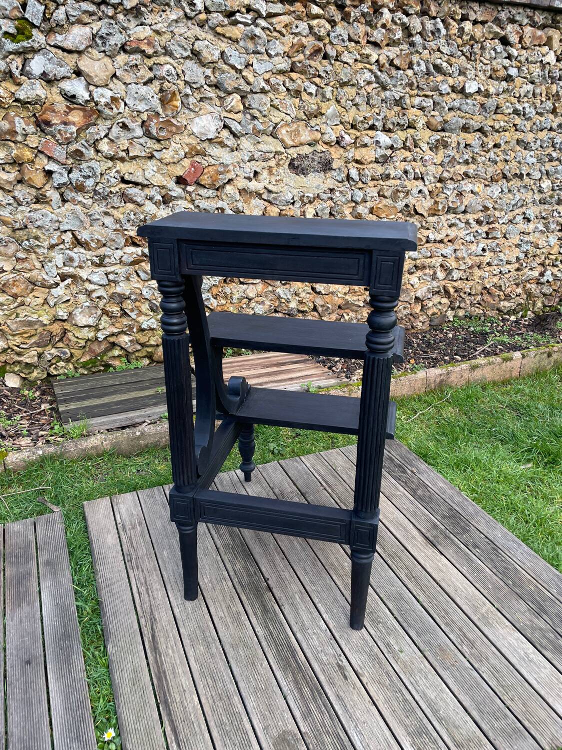 Old library stepladder in blackened wood