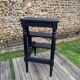 Old library stepladder in blackened wood