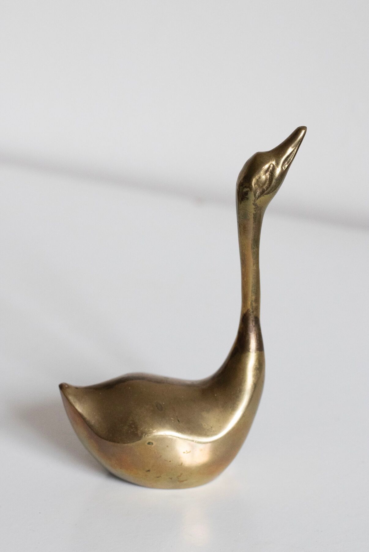 Pair of vintage brass swans