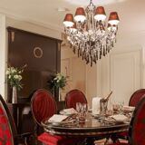 Pair of chandeliers in lacquered metal and faceted pearls