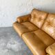 Two seats leather sofa, by Tobias Scarpa