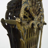 Old chimney fire barrier in fan. Gilded bronze. XIXth