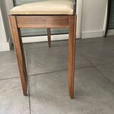 Piano bench that converts into a music book storage in excellent condition.