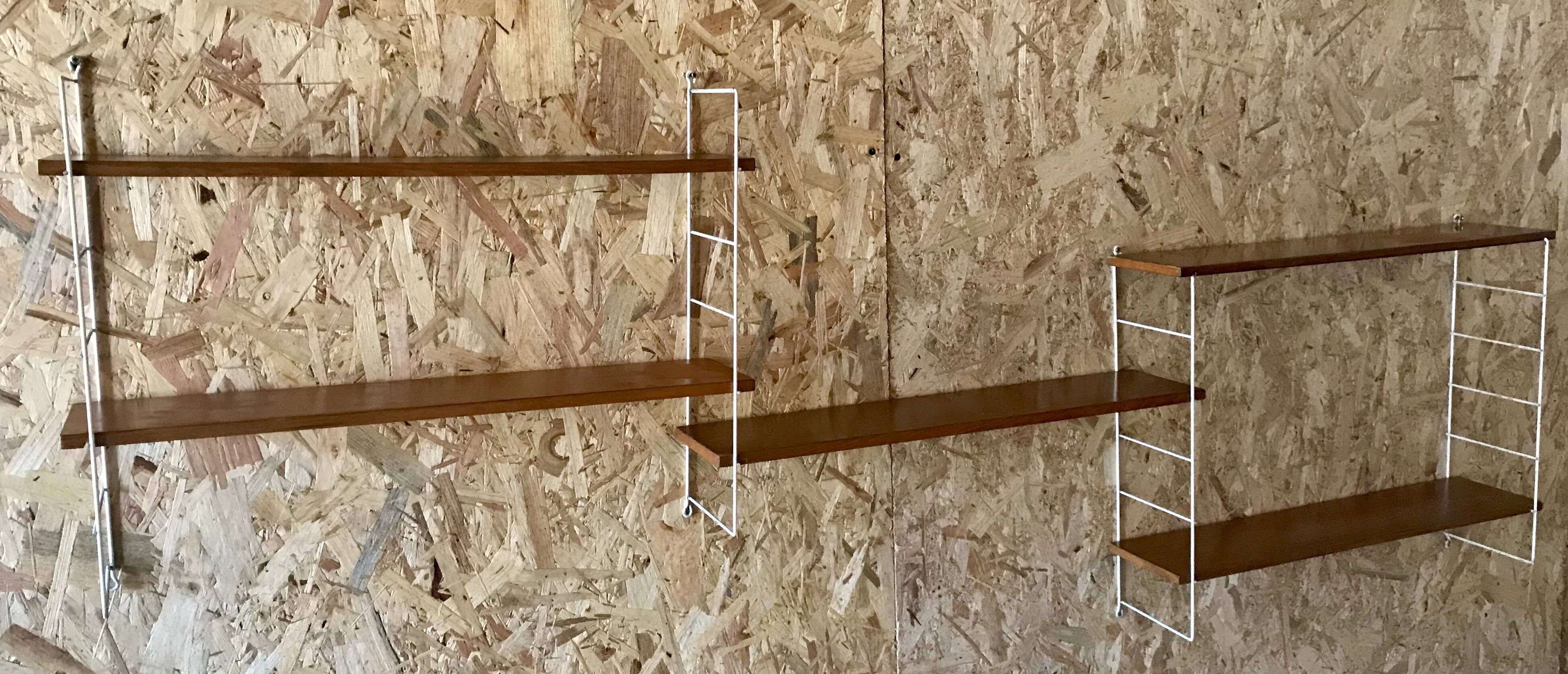 Vintage modular wall shelf with 4 supports and 5 levels.