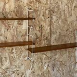 Vintage modular wall shelf with 4 supports and 5 levels.