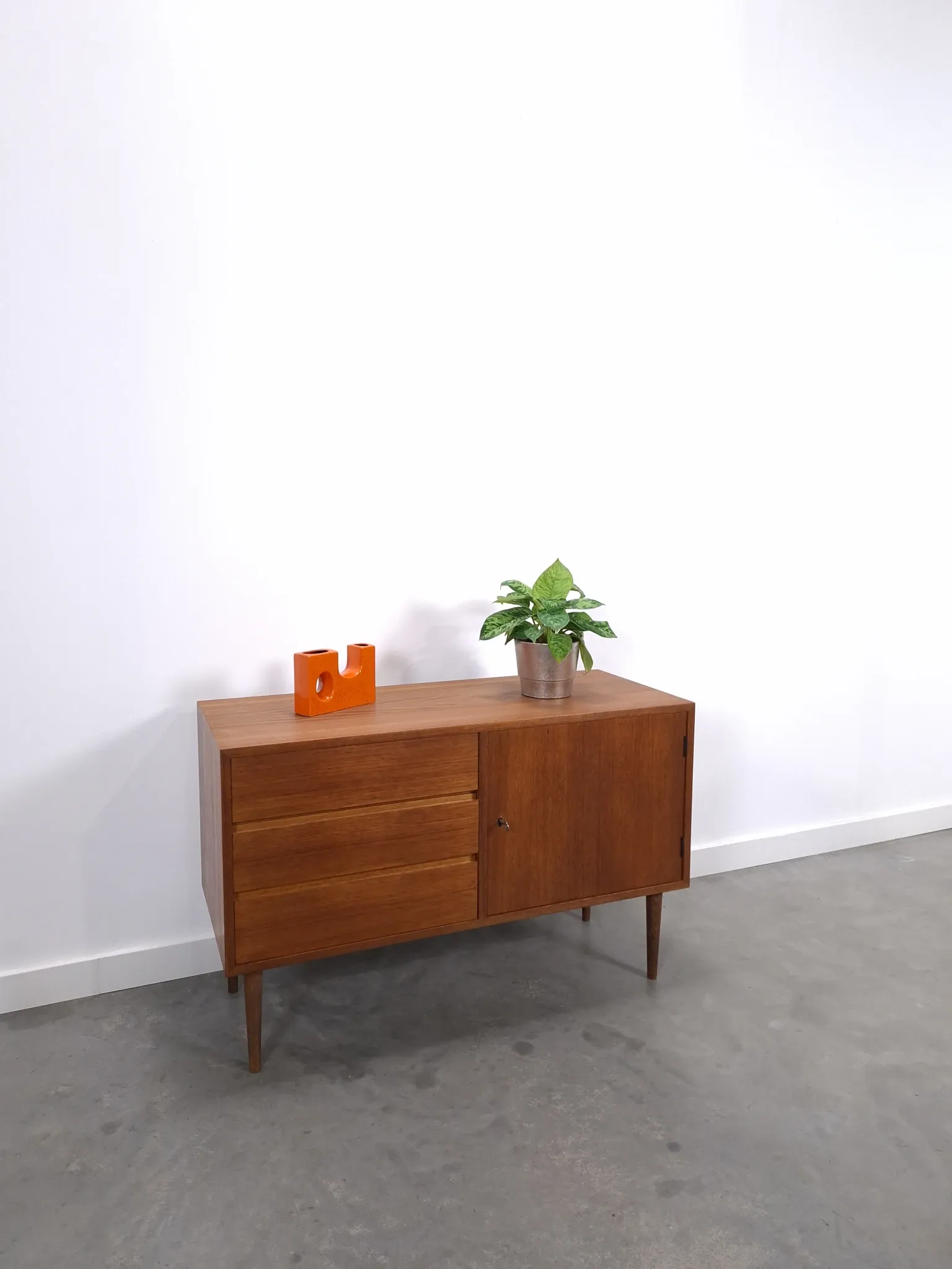 Vintage teak cabinet from the 1960s, sideboard with 3 drawers and a door.