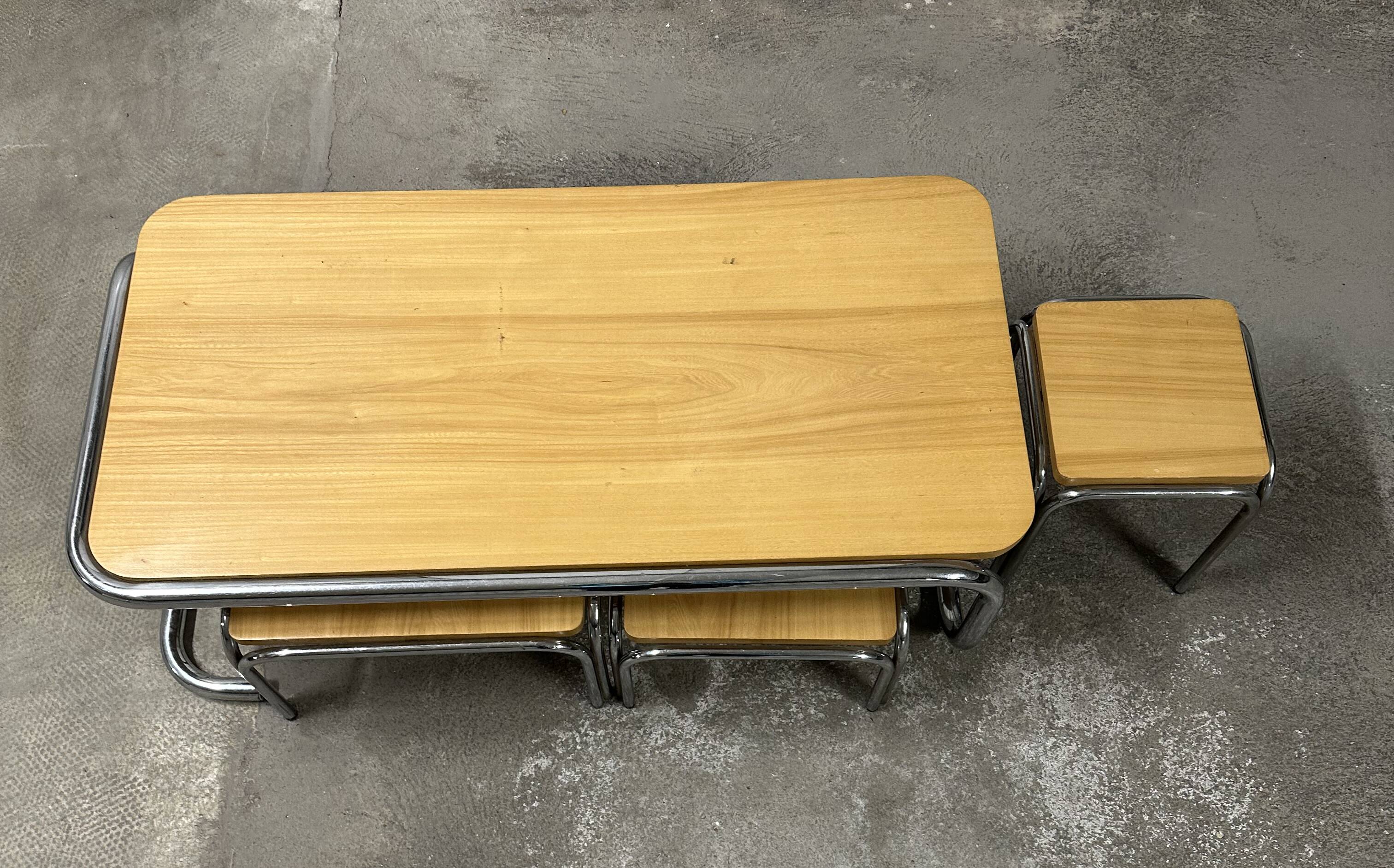 Set of 4 nesting coffee tables from the 70s, metal and solid oak.