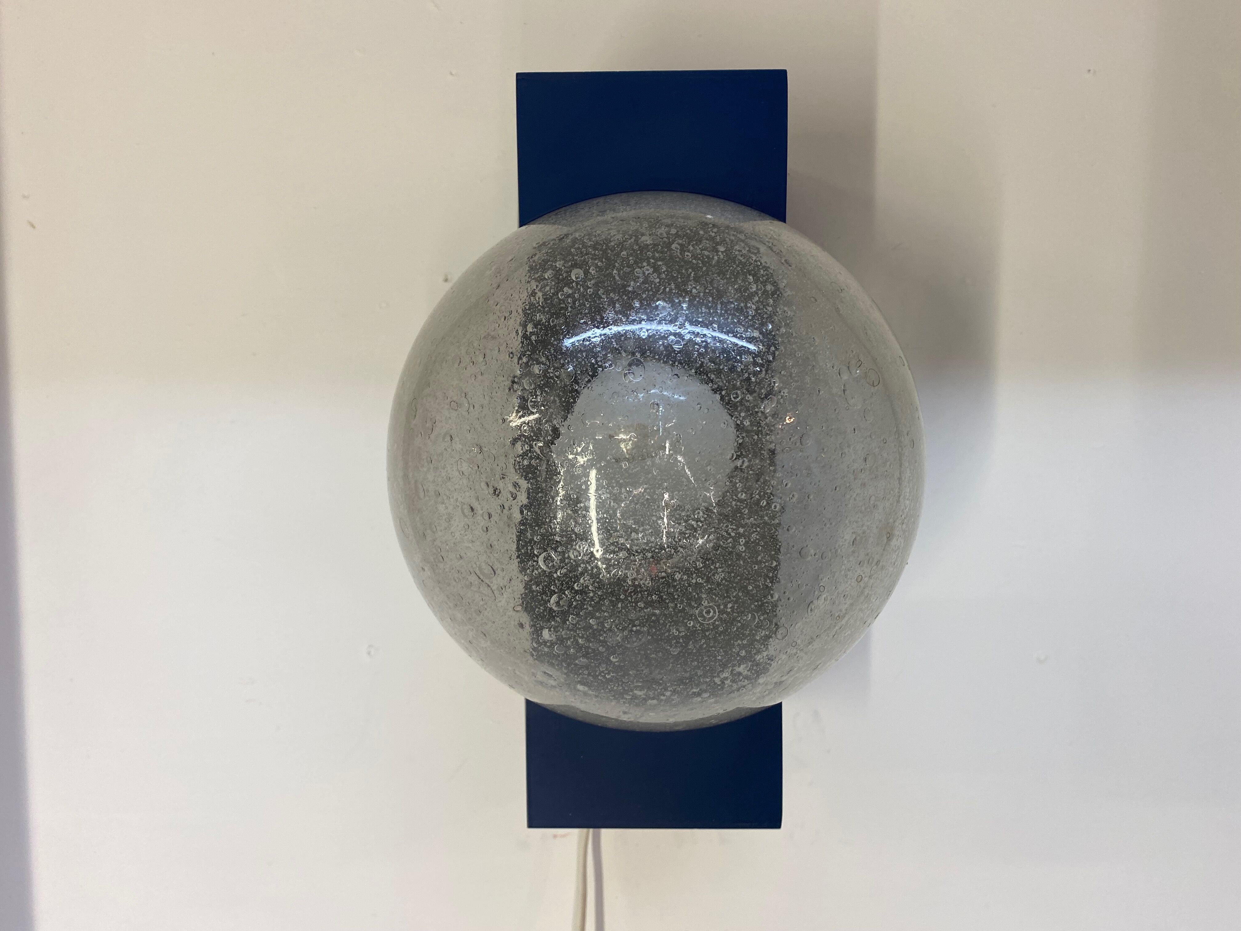 Vintage wall lamp by Raak design 1960