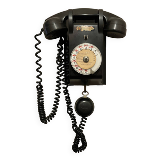 Old Ericsson wall telephone in black bakelite