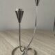 Paire de chandeliers modernistes en métal argenté