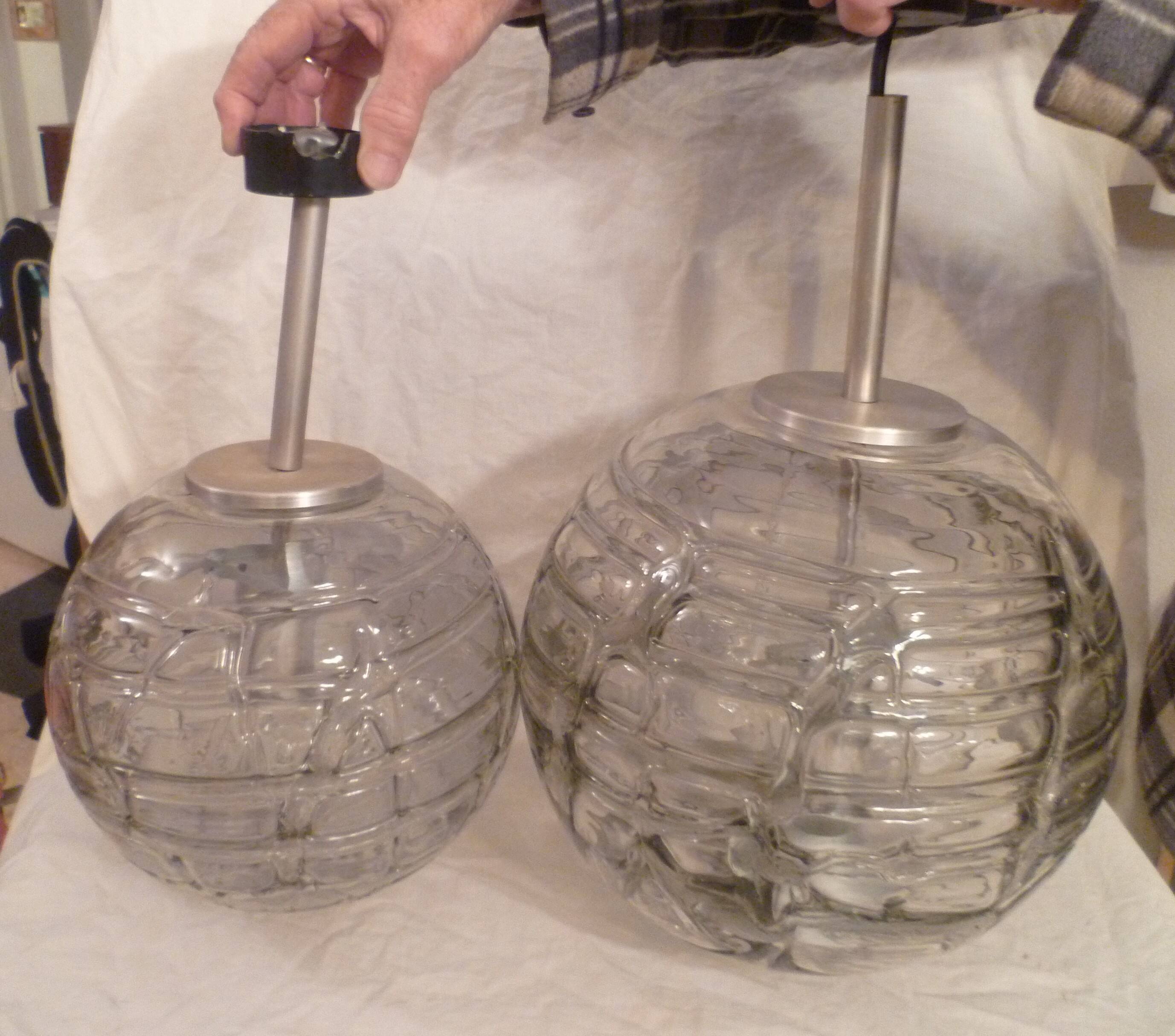 Set of 2 smoked glass ball suspensions by Doria Leuchten, Germany, 1970s.