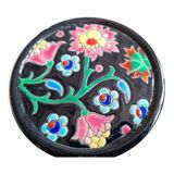 Pair of Longwy flower bottle underwear on black background. Rare