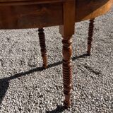 Half-moon table in solid walnut