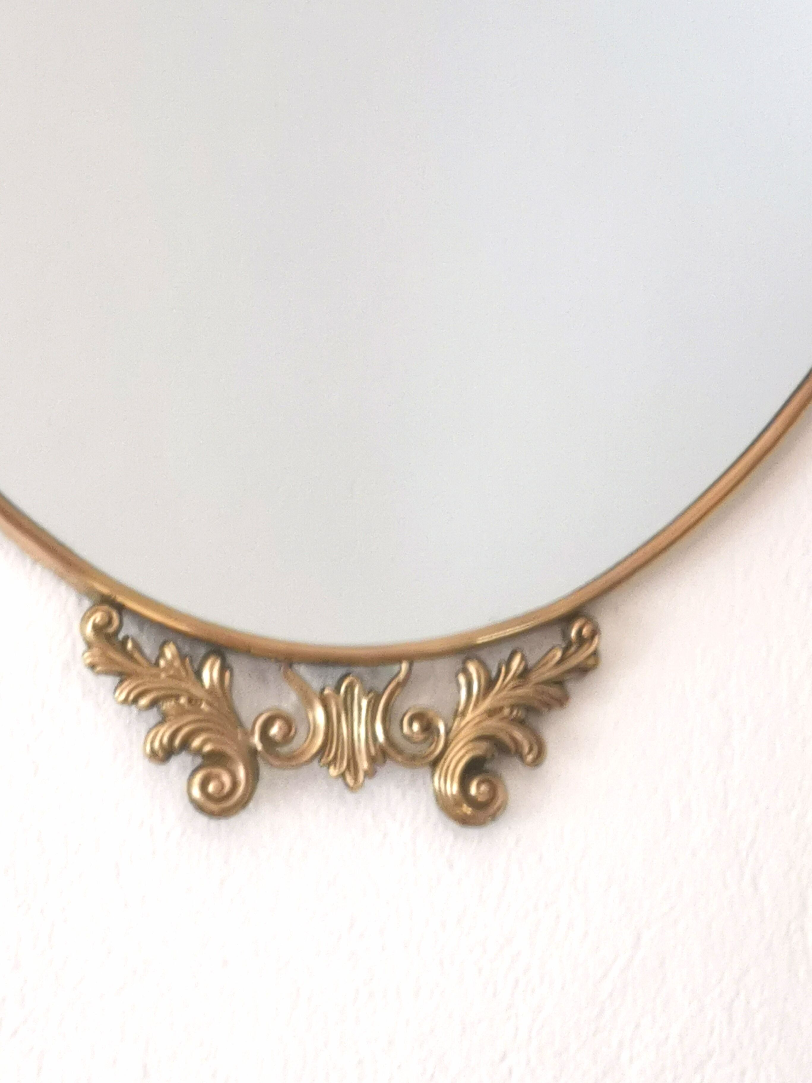 Baroque brass oval mirror, Venetian style  51x74cm