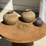 Natural solid mango side table (monoxyle) with conical legs.