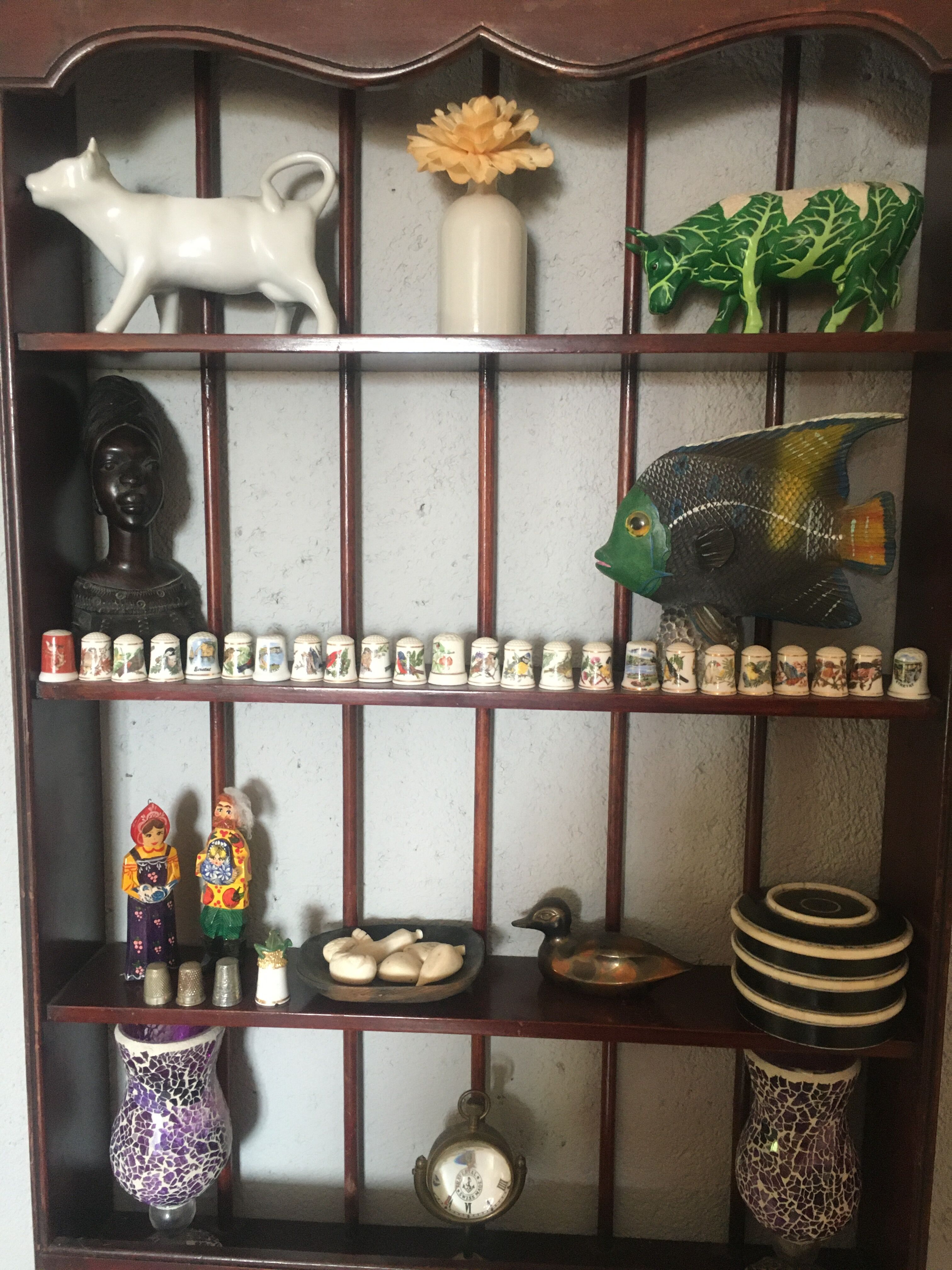 Carved wooden wall shelf for collection or other.