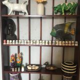 Carved wooden wall shelf for collection or other.