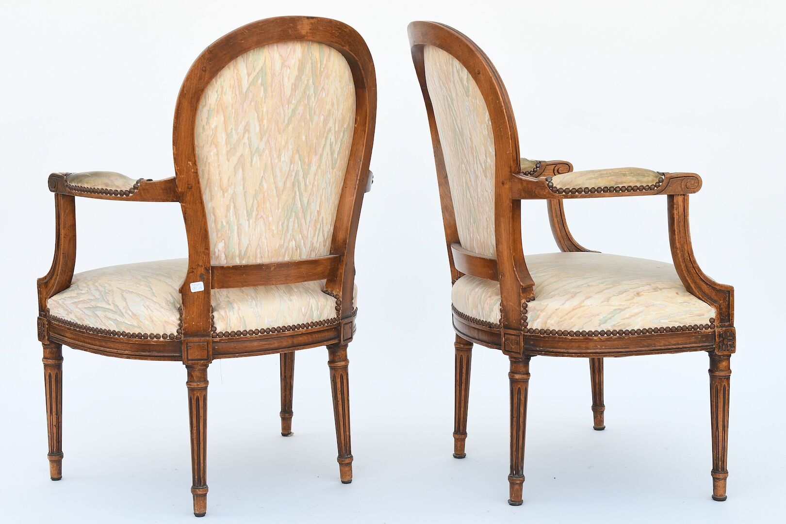 Pair of Louis XVI-style convertible armchairs