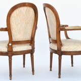 Pair of Louis XVI-style convertible armchairs